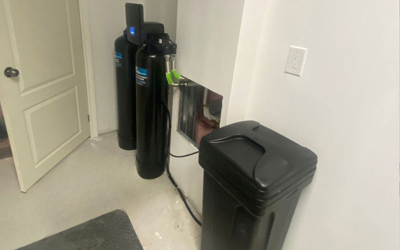 Whole house water softener installed at main water entry point for full-home protection